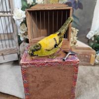 0 oiseau mecanique et sa cage