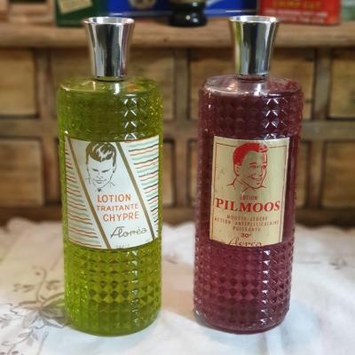 01 2 flacons de lotion cheveux