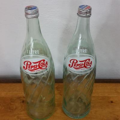 2 bouteuilles de pesi cola