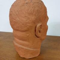 7 tete sculpture